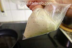 the dough in a small plastic bag
