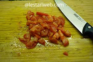 chopping tomato