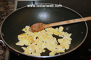 stir fry the beaten egg